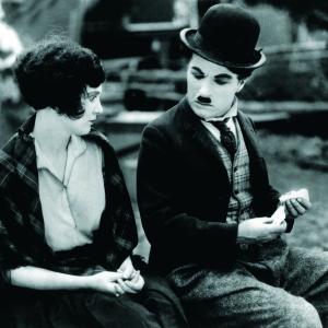Still of Charles Chaplin and Merna Kennedy in The Circus 1928