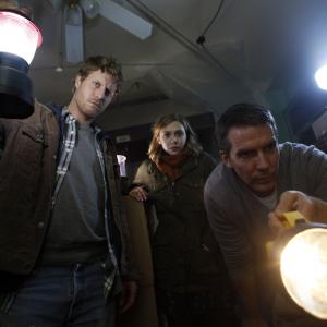 Still of Chris Kentis, Elizabeth Olsen, Adam Trese and Will Hart in Silent House (2011)