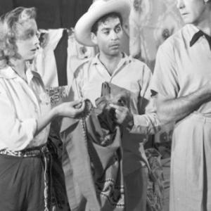 Evelyn Keyes, Dennis O'Keefe and José Torvay in One Big Affair (1952)