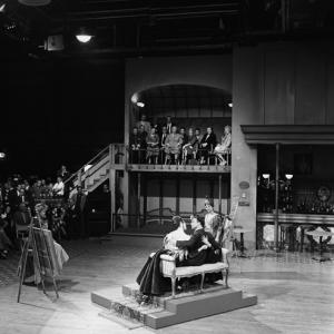Nikita Khrushchev watches on as Frank Sinatra performs on the set of the film CanCan at 20th Century Fox Hollywood studio 09191959