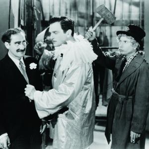 Still of Groucho Marx Walter Woolf King and Harpo Marx in A Night at the Opera 1935