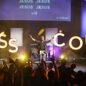 Gabriel leads worship on the Cross Country Tour