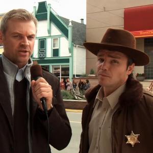 James Parnell interviews the sheriff in Embedded