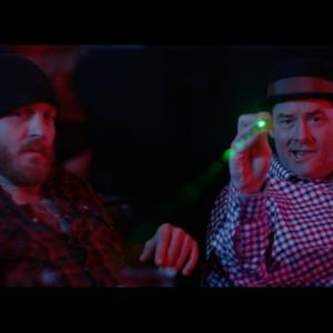 Still of Ethan Embry and David Koechner in Cheap Thrills 2013