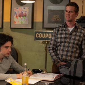 Still of Peter Krause and Max Burkholder in Parenthood (2010)