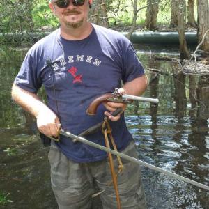 Flintlocks and swords in a swamp for 