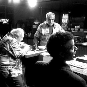Paul John Saxon and Mel Larry Gelman get some information from Joe Phil LaMarr in Old Dogs