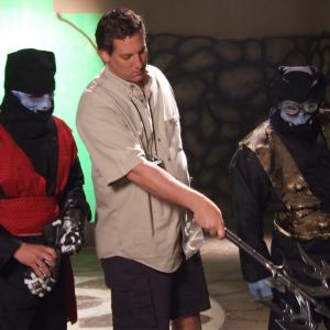 Ryan McVeigh Dan Lantz and Dave Mason discuss a stunt sequence for Ninja Babes from Space