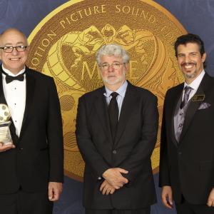 Randy Thom is presented his career achievement award, with George Lucas, and Mark Lanza at the 2013 Motion Picture Sound Editor's Awards.