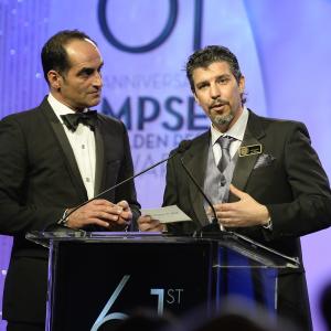 Navid Negahban Homelands infamous Abu Nazir and Mark Lanza MPSE Vice President present an award at the 2013 Motion Picture Sound Editor Awards