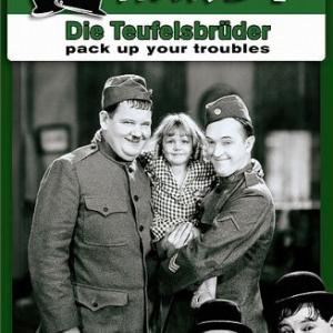Oliver Hardy Stan Laurel and Jackie Lyn Dufton in Pack Up Your Troubles 1932