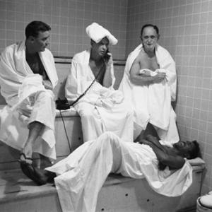 Peter Lawford Frank Sinatra Franks banker Al Hart and Sammy Davis Jr unwind in the Sands Hotel steam room in Las Vegas