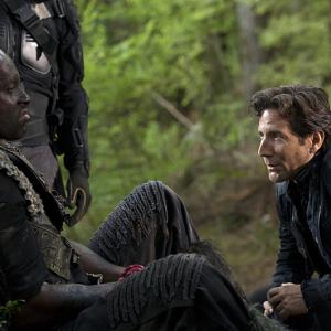 Still of Henry Ian Cusick and Colin Lawrence in The 100 (2014)