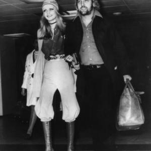 Twiggy with her manager-boyfriend Justin de Villeneuve leaving London to vacation in Barbados May 11, 1970