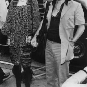 Twiggy with manager-boyfriend Justin de Villeneuve leaving Heathrow airport in London to vacation in Bermuda September 1, 1971