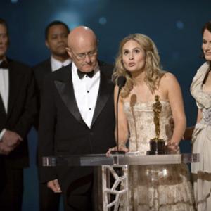 Kim Ledger, Sally Bell and Kate Ledger accept the Oscar® for Best Performance by an Actor in a Supporting Role on behalf of Heather Ledger for 