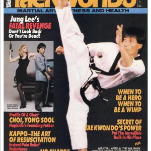 Julian Lee performs a high roundhouse kick for Taekwondo Times cover story