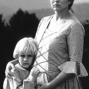 Still of Sheryl Lee and Tyler Noyes in Follow the River 1995