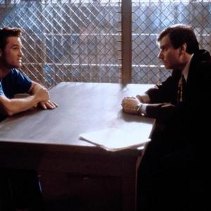 Kurt Russell and Ken Lerner in Unlawful Entry