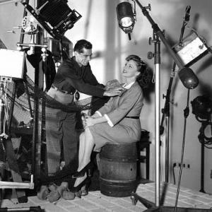 Joan Leslie on the Cinderella Jones set with photographer Scotty Welbourne 1946