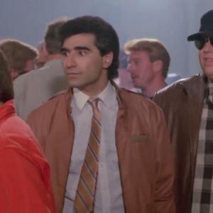 Still of Sydney Urshan Eugene Levy and John Candy in Armed and Dangerous 1986