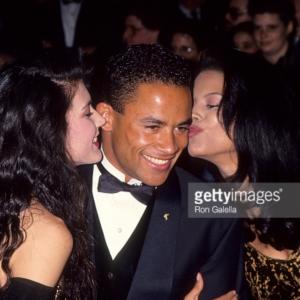 Co Star Rene Jones and real life girlfriend Brenda Balart Brown kiss Thyme Lewis on red carpet at Emmys 1997