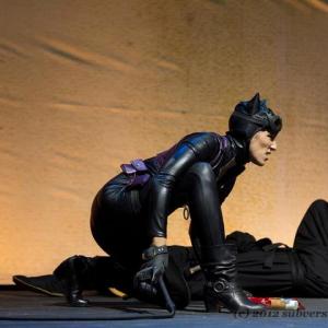 Catwoman with her whip at the stunt show at Comikaze Expo
