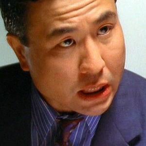 Robert Lin as Chan in Green Card Fever
