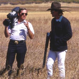 Director of Photography Larry Lindsey with actor Kurt Russell on a shoot for ESPN 1984