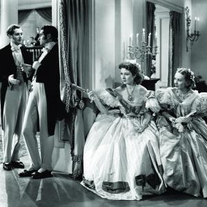 Still of Laurence Olivier Greer Garson Bruce Lester and Karen Morley in Pride and Prejudice 1940