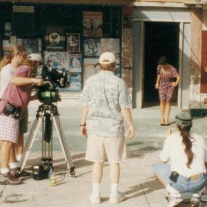 Tom Logan (back of head) directing on the set of ESCAPE FROM CUBA in Ft. Myers, Florida.