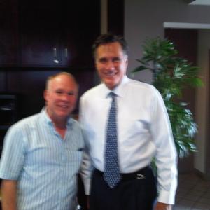 Tom Logan directs Mitt Romney.