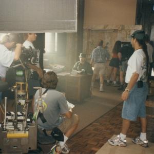 Tom Logan back of head directing on the set of ESCAPE FROM CUBA