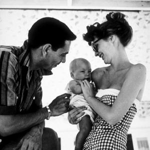 Jack Webb with his wife, Julia London, and baby at home, 1953.