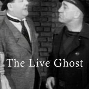Oliver Hardy and Walter Long in The Live Ghost 1934