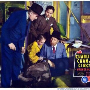 Olive Brasno, Francis Ford, Keye Luke and Warner Oland in Charlie Chan at the Circus (1936)