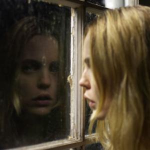 MELISSA GEORGE stars as Kathy Lutz in THE AMITYVILLE HORROR