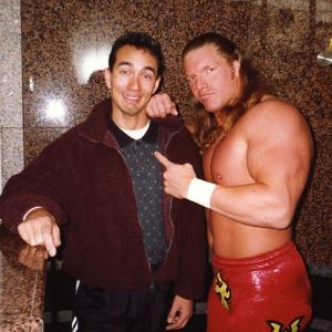 Yikes! Vincent with World Wrestling Champion Triple H