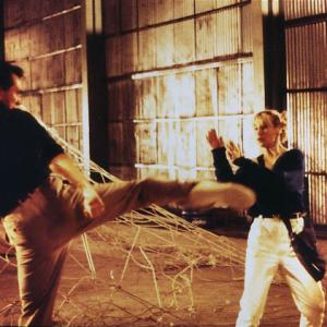 Vincent throwing a roundhouse kick at the ever talented Cynthia Rothrock in the film Blonde Fury