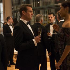 Still of Gabriel Macht and Gina Torres in Suits 2011