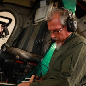 Mark preflight of a Hughes 500 D on the set of La Migra as the border patrol helicopter pilot