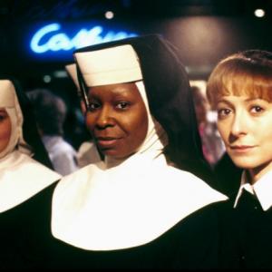 Whoopi Goldberg in the 1992 film Sister Act with co-stars Kathy Najim (l) and Wendy Makkena (r)