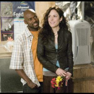 Still of Mary-Louise Parker and Romany Malco in Weeds (2005)