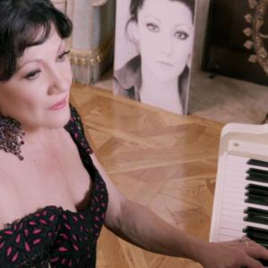Irina Maleeva in her music video for Illusions