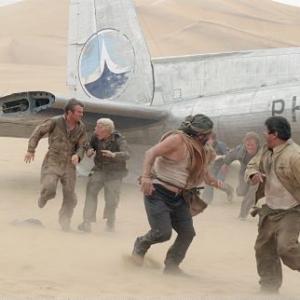 The Mongolian desert and weather wreak havoc on the survivors of a crashed plane, (L - R) Dennis Quaid as Towns, Giovanni Ribisi as Elliott, Kevork Malikyan, Miranda Otto, Scott Michael Campbell, Jacob Vargas, and Hugh Laurie.