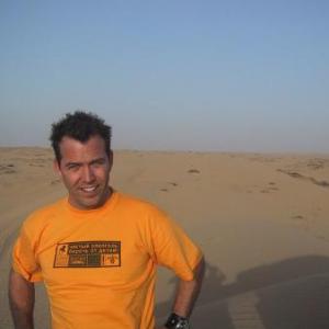 Neil Mandt on location in the Arabian Desert