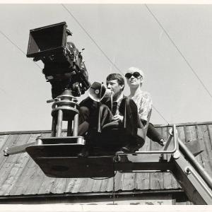 Shari Mann (Sharon Evanoff) with cameraman on set during filming 1968.