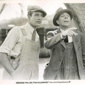 Still of George Arliss and David Manners in The Millionaire (1931)