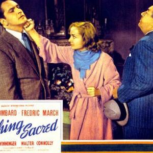 Carole Lombard Walter Connolly and Fredric March in Nothing Sacred 1937