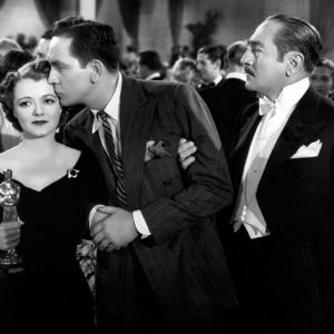 Still of Janet Gaynor Fredric March and Adolphe Menjou in A Star Is Born 1937